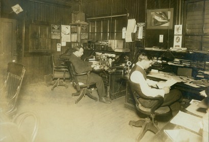 Two Men Two Desks